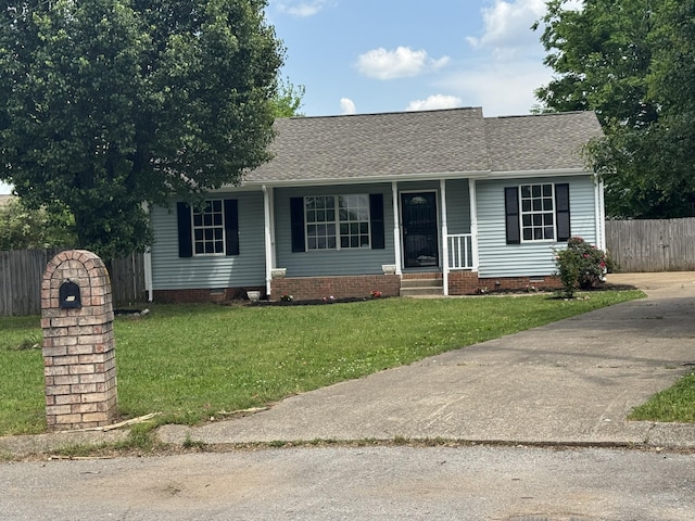 single story home featuring fence, a shingled roof, a front lawn, crawl space, and covered porch