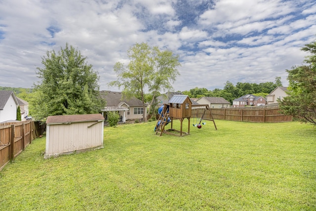 1137 Stillwood Dr, Clarksville, TN 37042 - view of yard with a playground, a storage unit, and an outbuilding