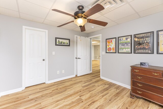 1137 Stillwood Dr, Clarksville, TN 37042 - bedroom featuring a paneled ceiling, light wood-style floors, baseboards, and a ceiling fan