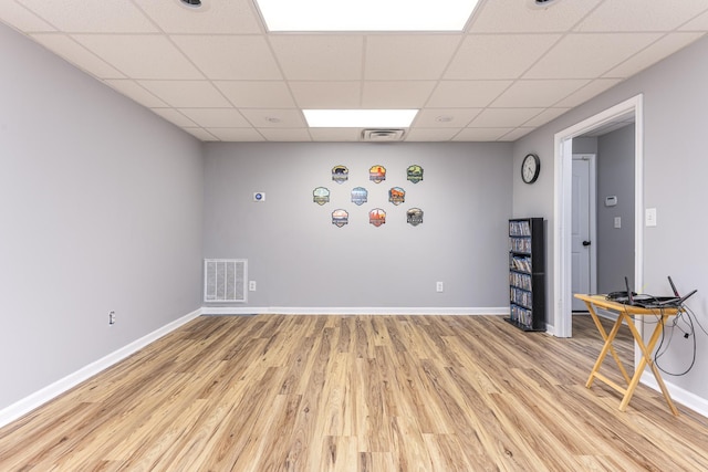 1137 Stillwood Dr, Clarksville, TN 37042 - unfurnished room featuring light wood-style floors, a drop ceiling, and baseboards