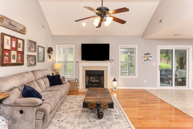 1137 Stillwood Dr, Clarksville, TN 37042 - living area featuring a ceiling fan, light wood-type flooring, healthy amount of natural light, and high vaulted ceiling