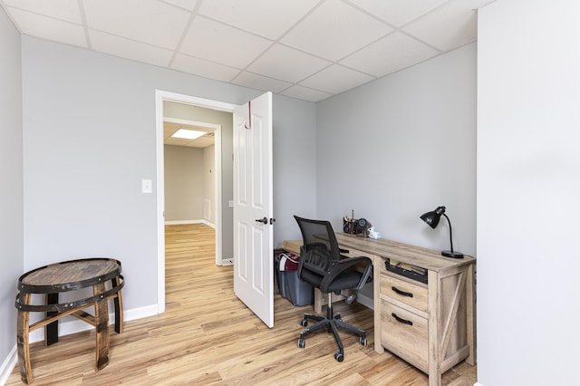 1137 Stillwood Dr, Clarksville, TN 37042 - office area featuring light wood-style floors, a drop ceiling, and baseboards