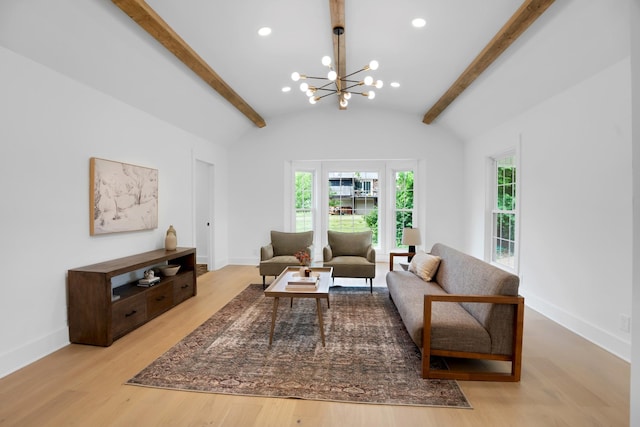 living area featuring recessed lighting, lofted ceiling with beams, wood finished floors, and an inviting chandelier