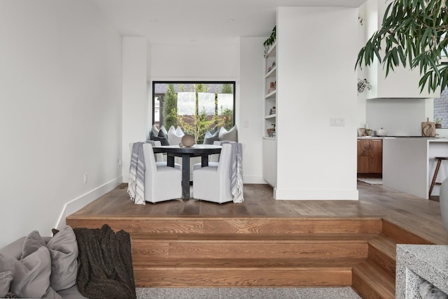 interior space featuring baseboards