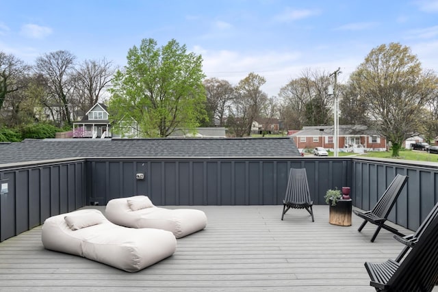 wooden terrace featuring a residential view