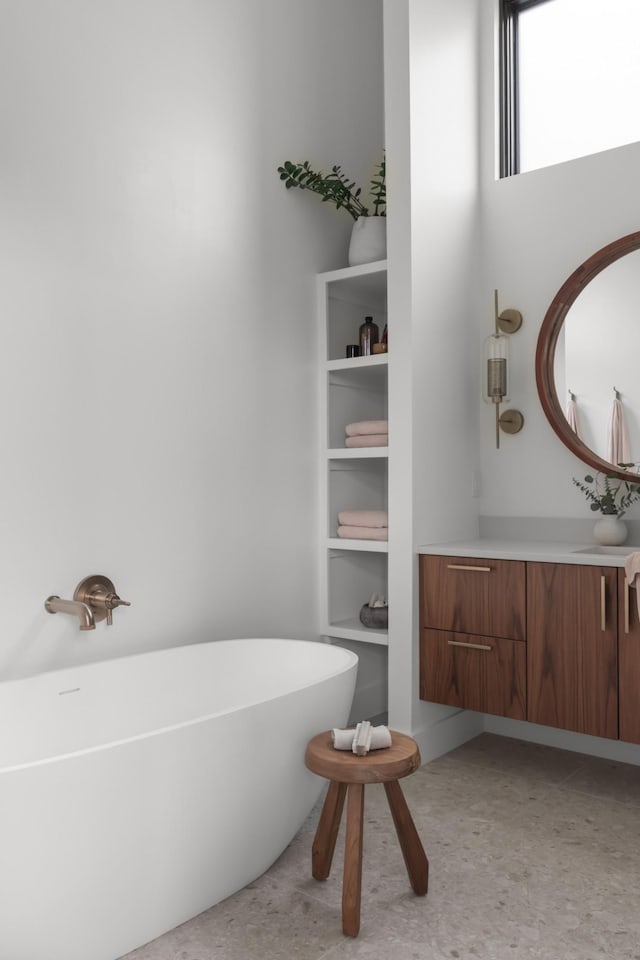 bathroom featuring a freestanding tub
