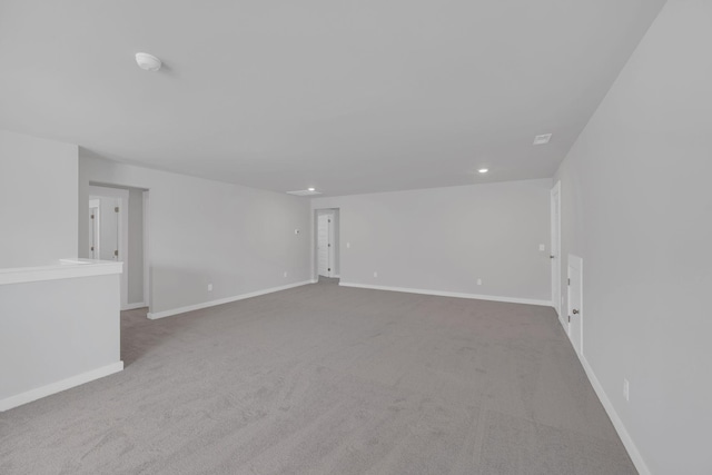 interior space featuring recessed lighting and baseboards