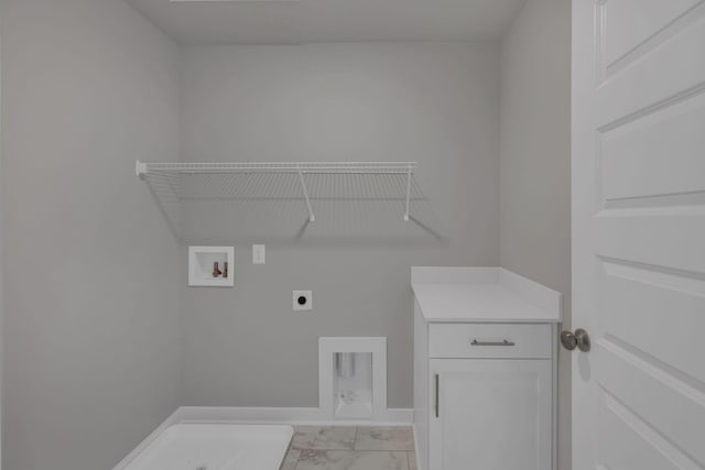 washroom featuring baseboards, hookup for an electric dryer, hookup for a washing machine, and marble finish floor