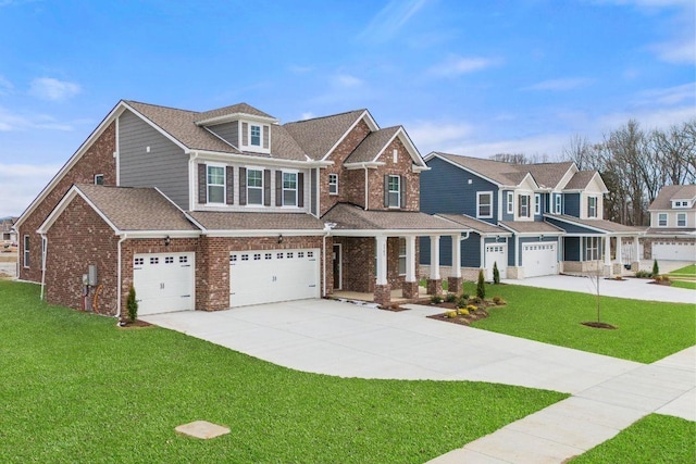 craftsman inspired home with a residential view, an attached garage, brick siding, a front yard, and driveway