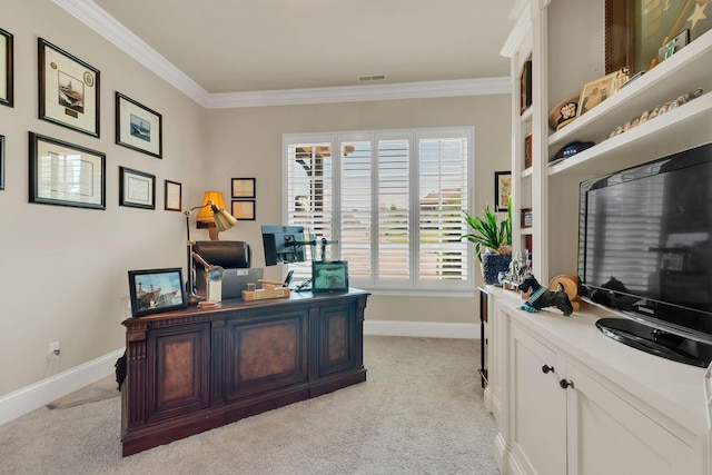 office space featuring crown molding, baseboards, visible vents, and light carpet