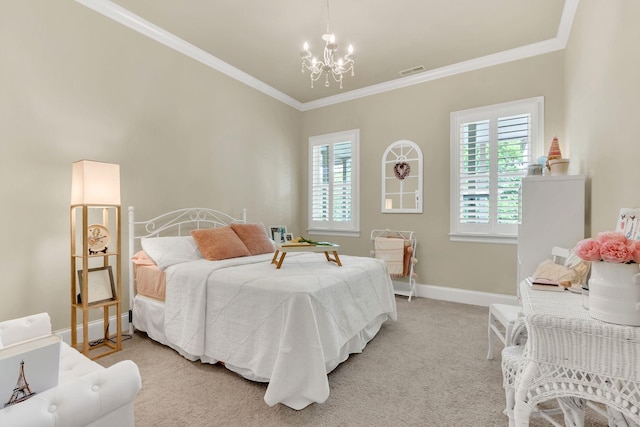 bedroom featuring an inviting chandelier, crown molding, multiple windows, and visible vents