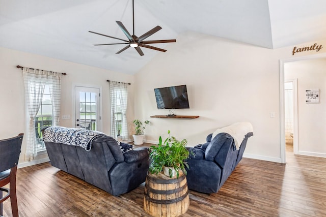 living room featuring wood finished floors, baseboards, ceiling fan, and high vaulted ceiling