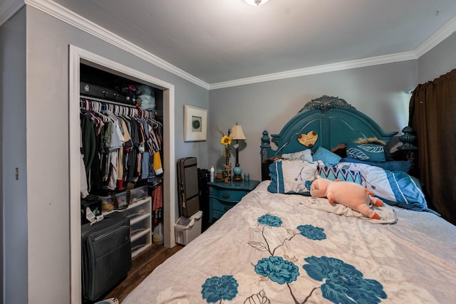 bedroom featuring a closet, ornamental molding, and dark wood-style flooring