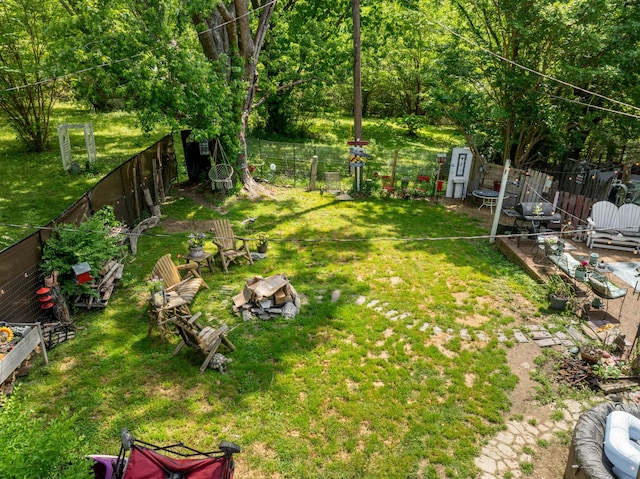 view of yard with a fenced backyard