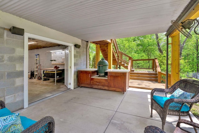 view of patio with stairway and grilling area