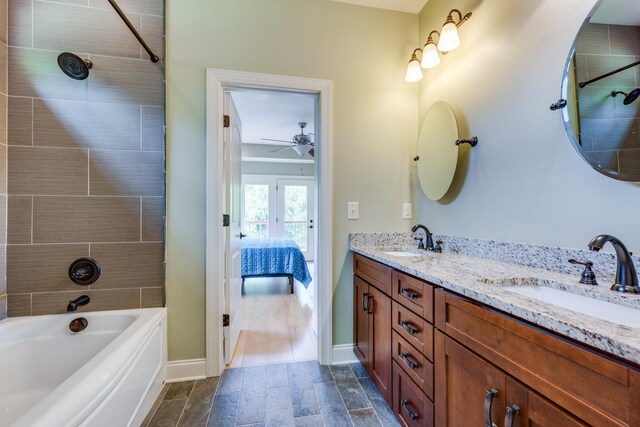 1545 Gravel Hill Rd, Columbia, TN 38401 - full bathroom with baseboards, a sink, a ceiling fan, and double vanity