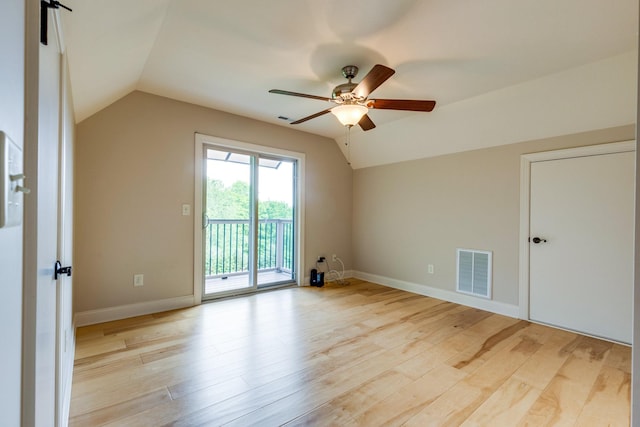 1545 Gravel Hill Rd, Columbia, TN 38401 - unfurnished room with visible vents, vaulted ceiling, and light wood-type flooring