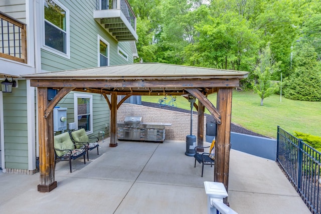 1545 Gravel Hill Rd, Columbia, TN 38401 - view of patio featuring an outdoor kitchen, a gazebo, and a grill
