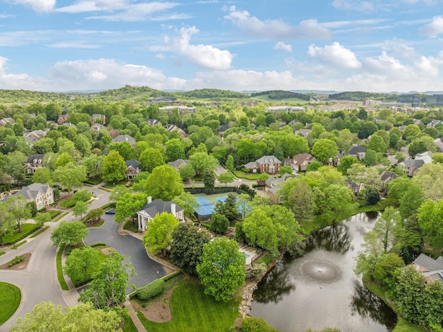 aerial view with a water view and a residential view