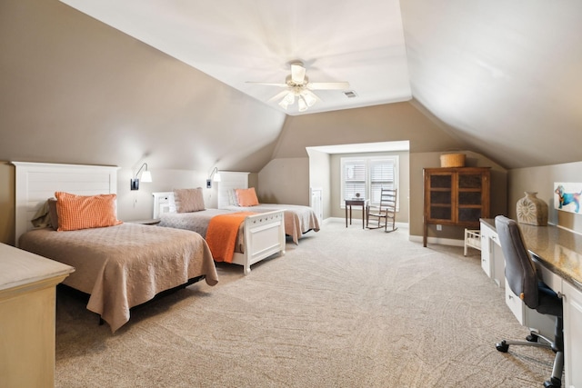 bedroom featuring ceiling fan, visible vents, light carpet, and lofted ceiling