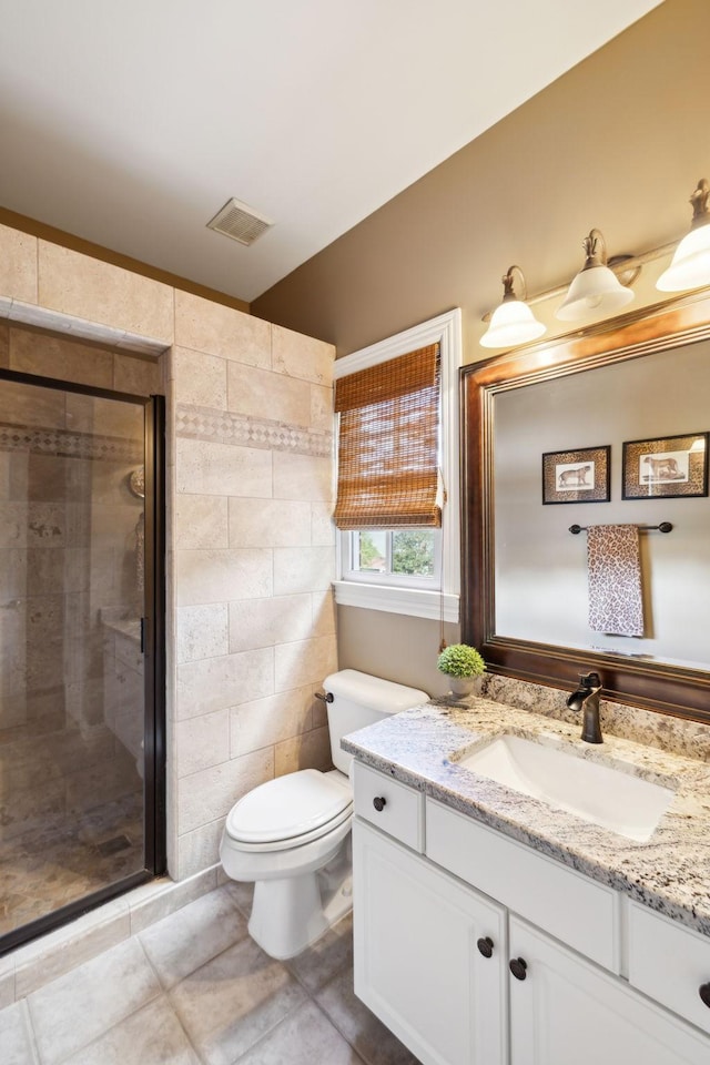 full bathroom featuring vanity, toilet, tile walls, and a stall shower