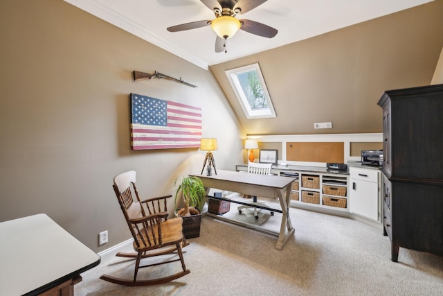 home office featuring a ceiling fan, visible vents, a skylight, crown molding, and light colored carpet