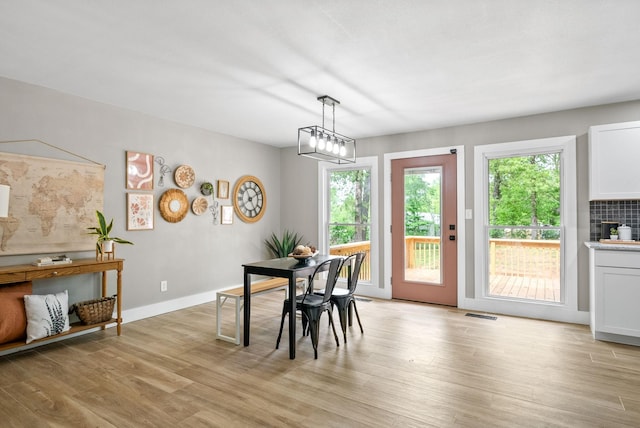 77 Deepwood Est, Cadiz, KY 42211 - dining area featuring light wood-style floors, baseboards, and visible vents