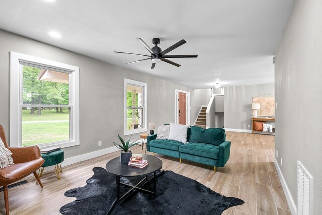 77 Deepwood Est, Cadiz, KY 42211 - living area featuring baseboards, plenty of natural light, and stairs