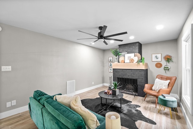 77 Deepwood Est, Cadiz, KY 42211 - living area with baseboards, a fireplace, a ceiling fan, and visible vents