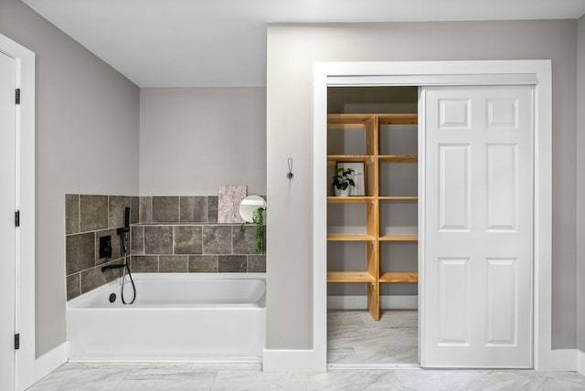 77 Deepwood Est, Cadiz, KY 42211 - bathroom with a bath, baseboards, marble finish floor, and a fireplace