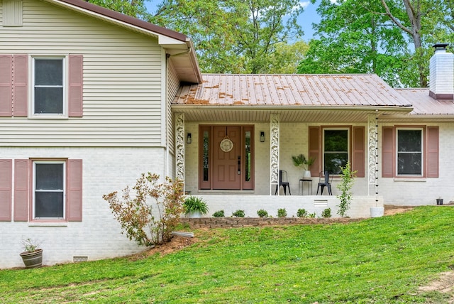 77 Deepwood Est, Cadiz, KY 42211 - split level home with covered porch, metal roof, a chimney, a front yard, and brick siding