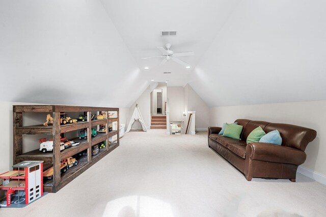 6553 Stableford Ln, Franklin, TN 37069 - living area with ceiling fan, visible vents, vaulted ceiling, carpet floors, and an upstairs landing