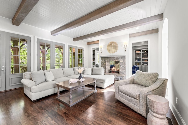6553 Stableford Ln, Franklin, TN 37069 - living area featuring a stone fireplace, baseboards, wood finished floors, and beamed ceiling