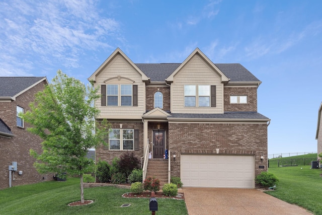13 Settlers Ct, Mount Juliet, TN 37122 - view of front of property with brick siding, a garage, a front lawn, and driveway