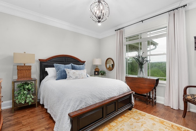 bedroom featuring crown molding, baseboards, an inviting chandelier, recessed lighting, and light wood-style flooring