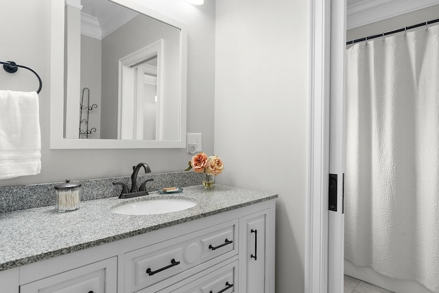 full bath featuring vanity and ornamental molding