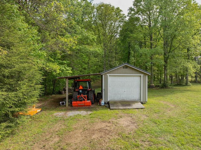 garage featuring a wooded view