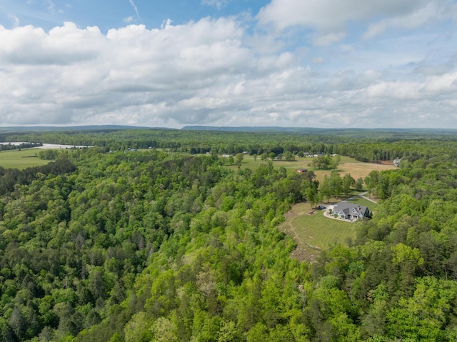 bird's eye view featuring a forest view