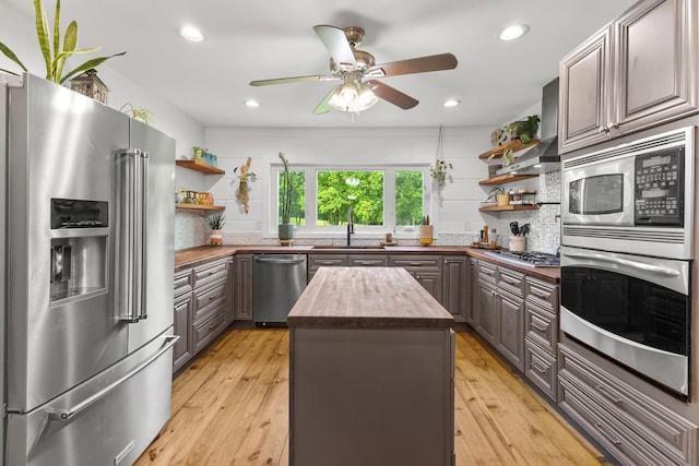 3124 Southall Rd, Franklin, TN 37064 - kitchen with butcher block counters, appliances with stainless steel finishes, open shelves, a sink, and a ceiling fan