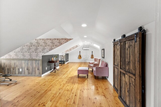 3124 Southall Rd, Franklin, TN 37064 - living area featuring lofted ceiling, light wood finished floors, recessed lighting, an AC wall unit, and baseboards