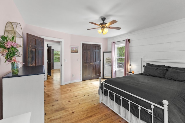 3124 Southall Rd, Franklin, TN 37064 - bedroom with light wood-style floors, baseboards, a closet, and a ceiling fan