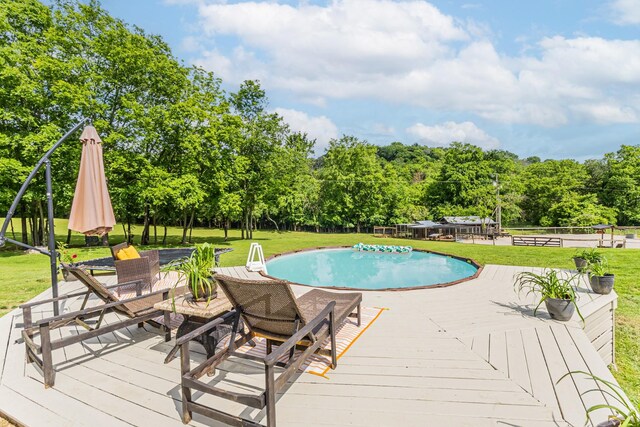 3124 Southall Rd, Franklin, TN 37064 - outdoor pool featuring a wooden deck, a yard, and view of scattered trees