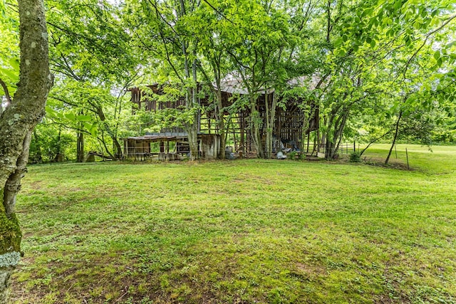 3124 Southall Rd, Franklin, TN 37064 - view of green lawn with an outdoor structure