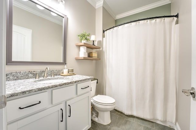 bathroom featuring tile patterned floors, toilet, vanity, and ornamental molding