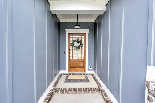 property entrance with board and batten siding