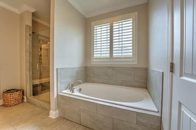full bathroom with a stall shower, crown molding, a bath, and wood finished floors