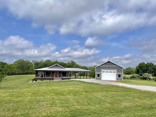 view of front facade featuring a carport, an outdoor structure, gravel driveway, and a front lawn