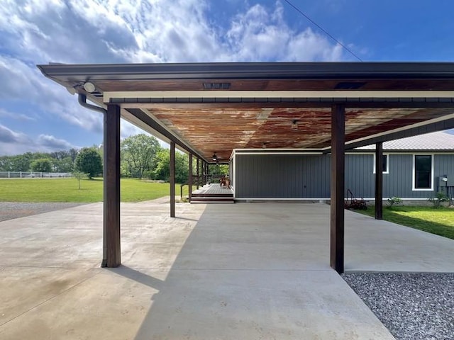 view of parking featuring fence