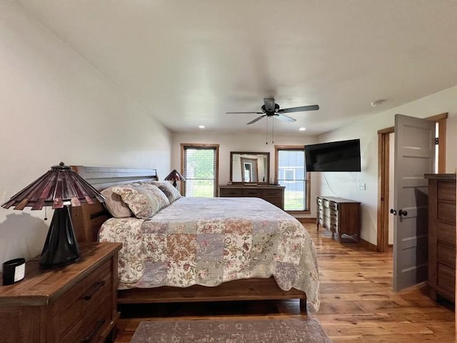 bedroom featuring light wood-style floors, recessed lighting, baseboards, and ceiling fan