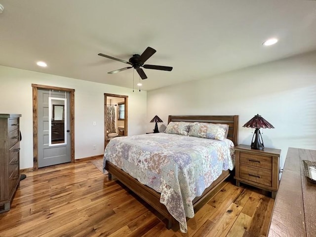bedroom with light wood-style floors, baseboards, ceiling fan, and recessed lighting